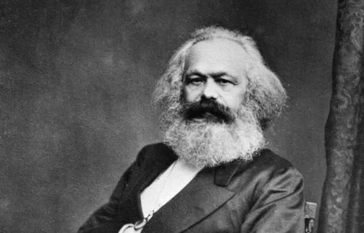 Karl Marx is known as the father of what system of government?